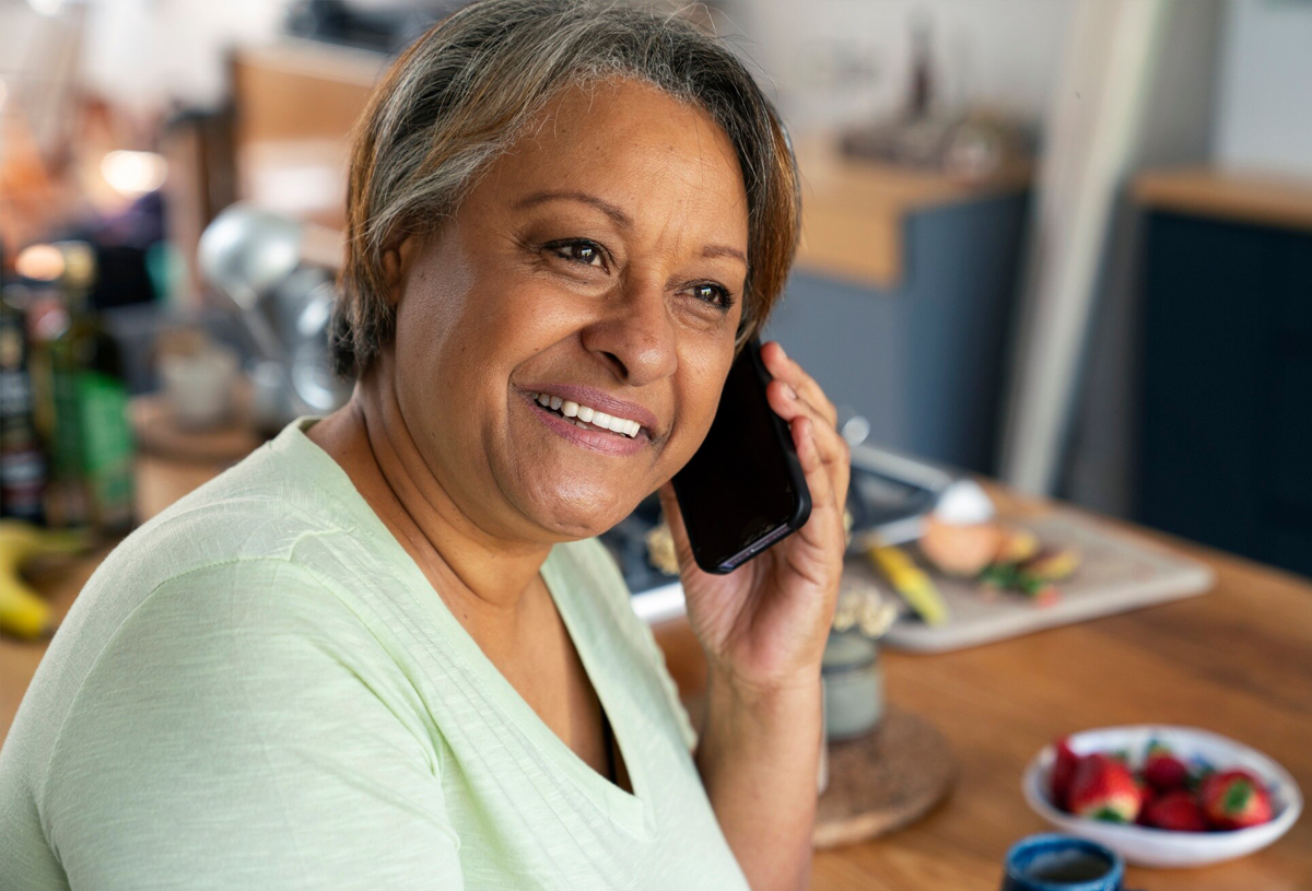 Latino Woman Receiving Help on Phone